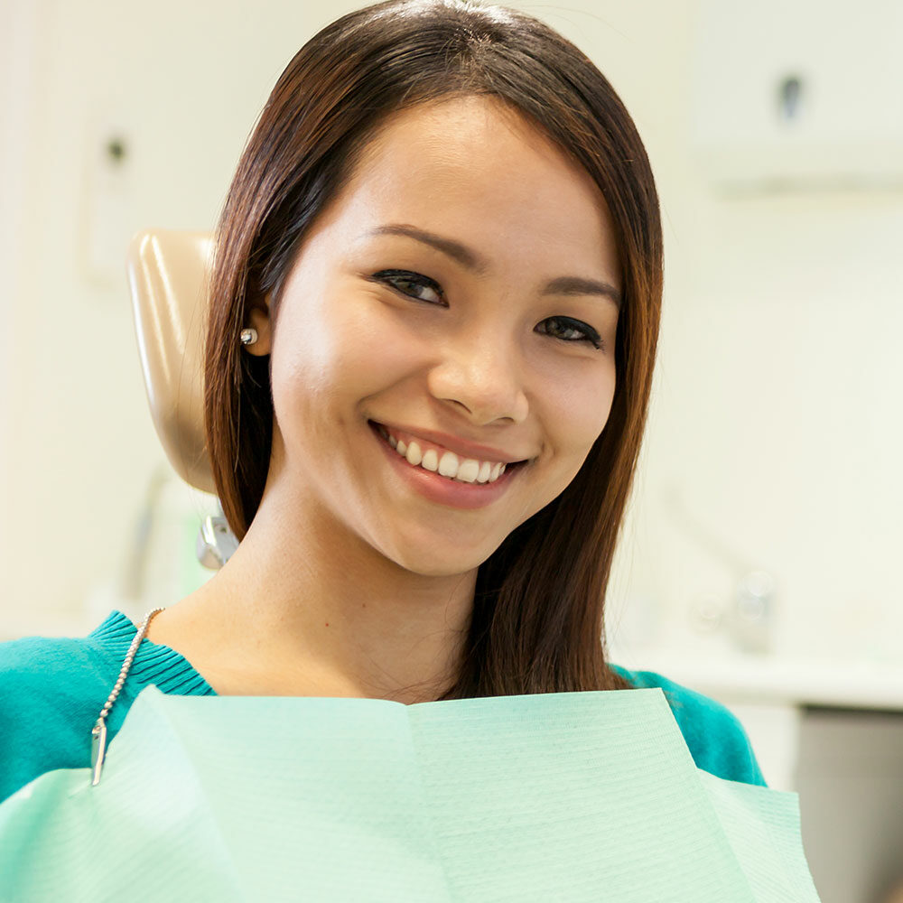 Portrait Of Young Woman At The Dentist